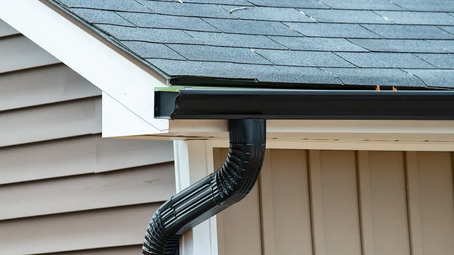 rain gutter on roof with a downpipe 