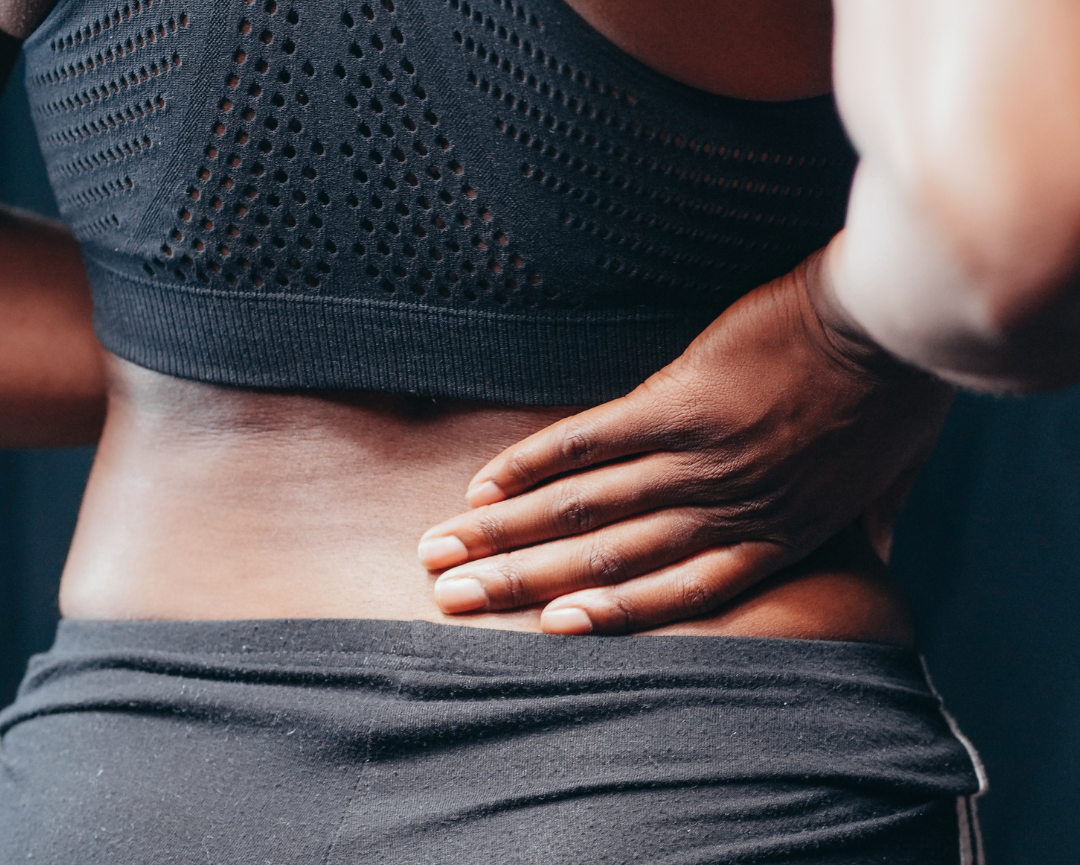 Physiotherapist performing trigger point therapy for neck and shoulder tension