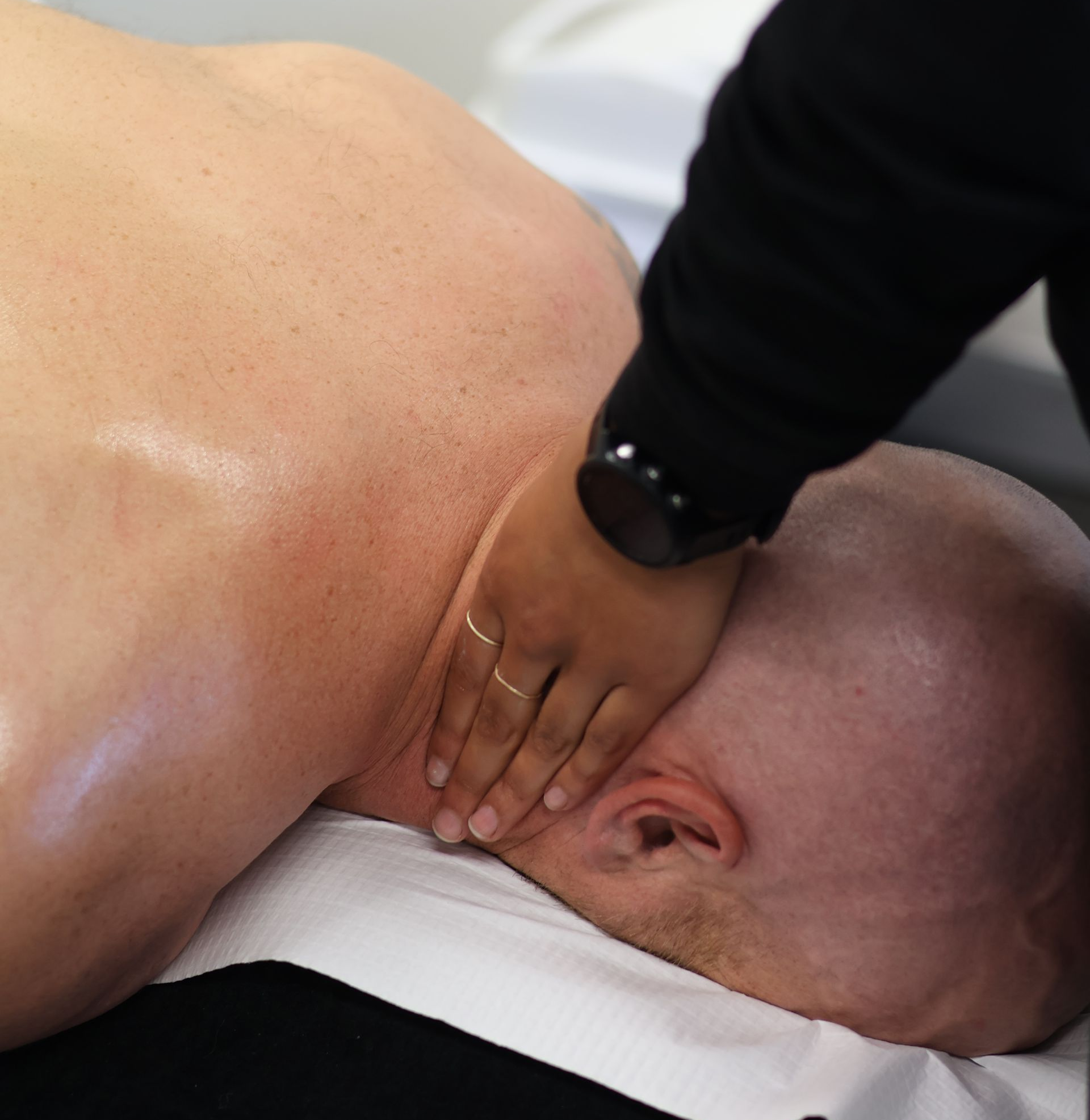 Physio performing joint mobilisation for neck pain at Active Balance clinic, St Marys
