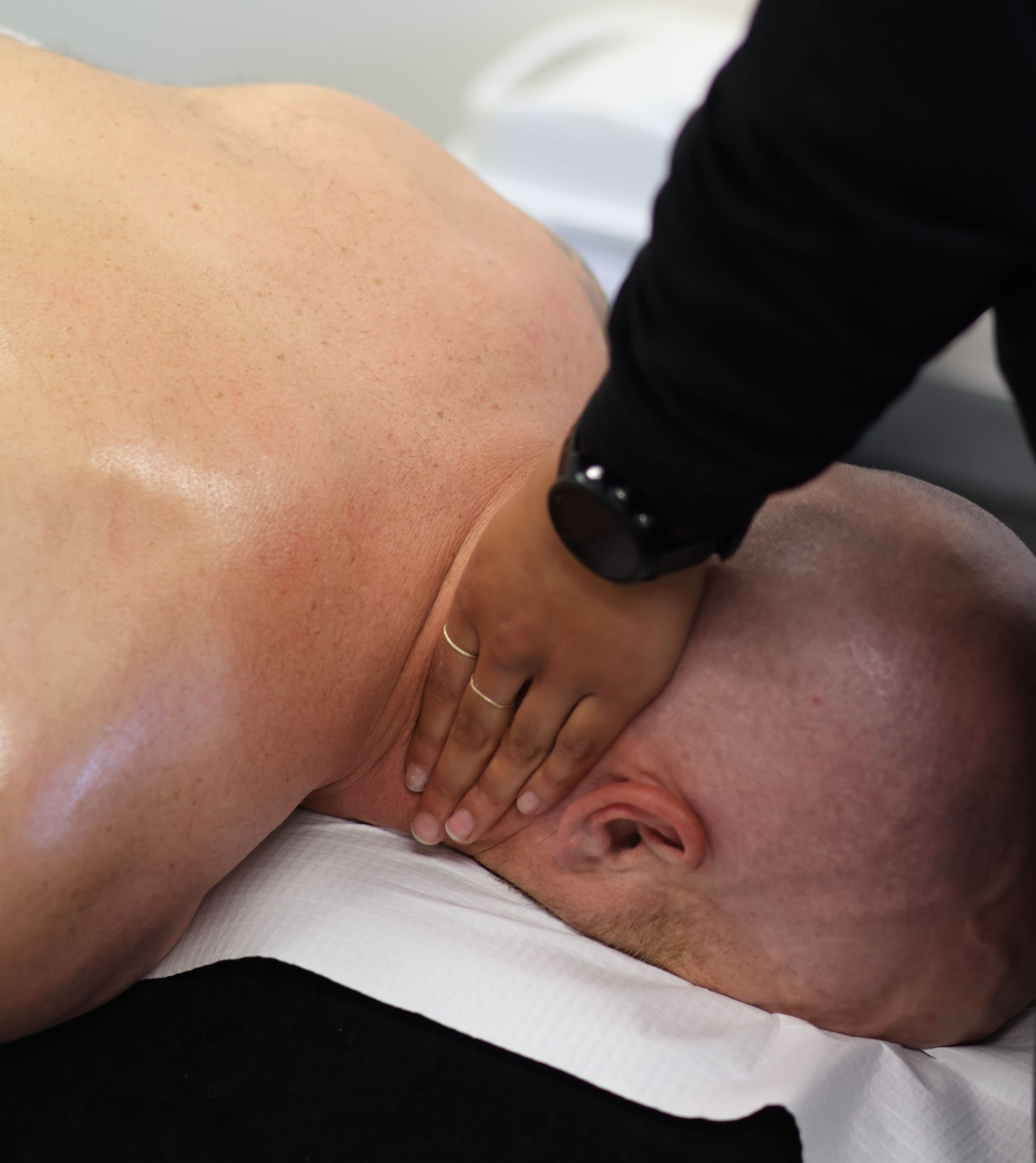 Physio performing joint mobilisation for neck pain at Active Balance clinic, St Marys