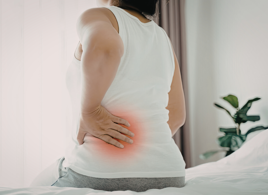 female with back pain
