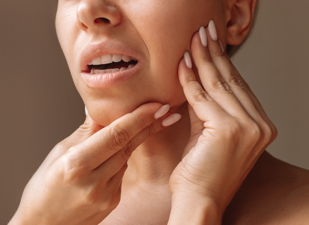 person with jaw pain