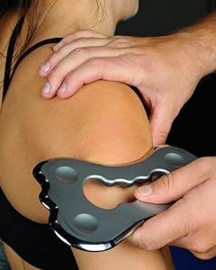 Physiotherapist using IASTM at Active Balance Physio & Wellness