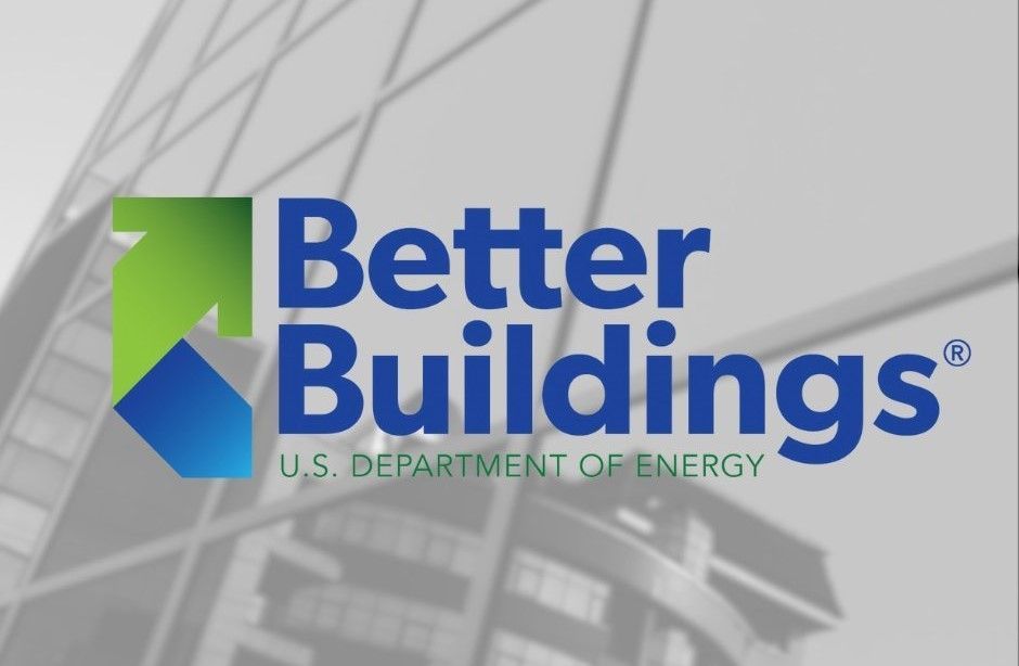 A better buildings logo with a building in the background
