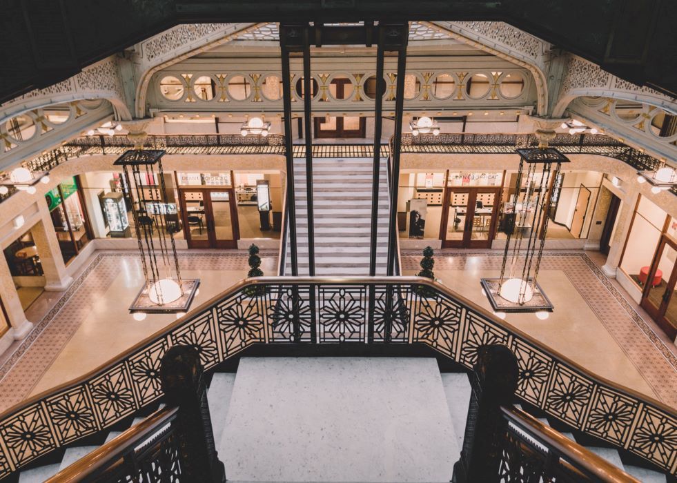 An aerial view of a building with stairs and a balcony