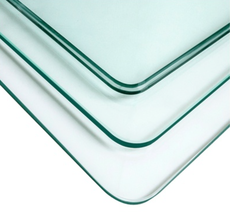 Three pieces of clear glass are stacked on top of each other