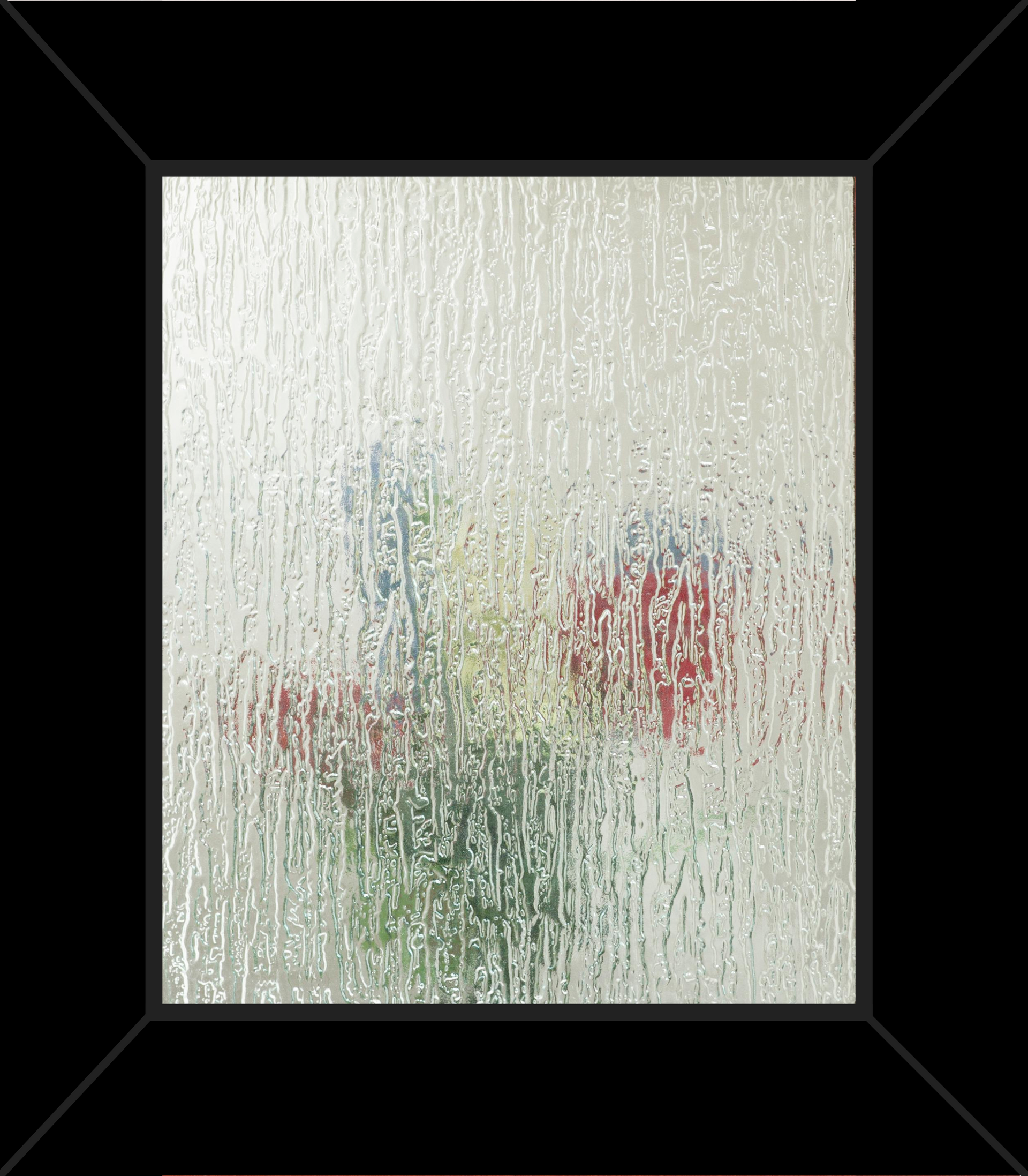 A picture of flowers in a vase on a window with a black frame.