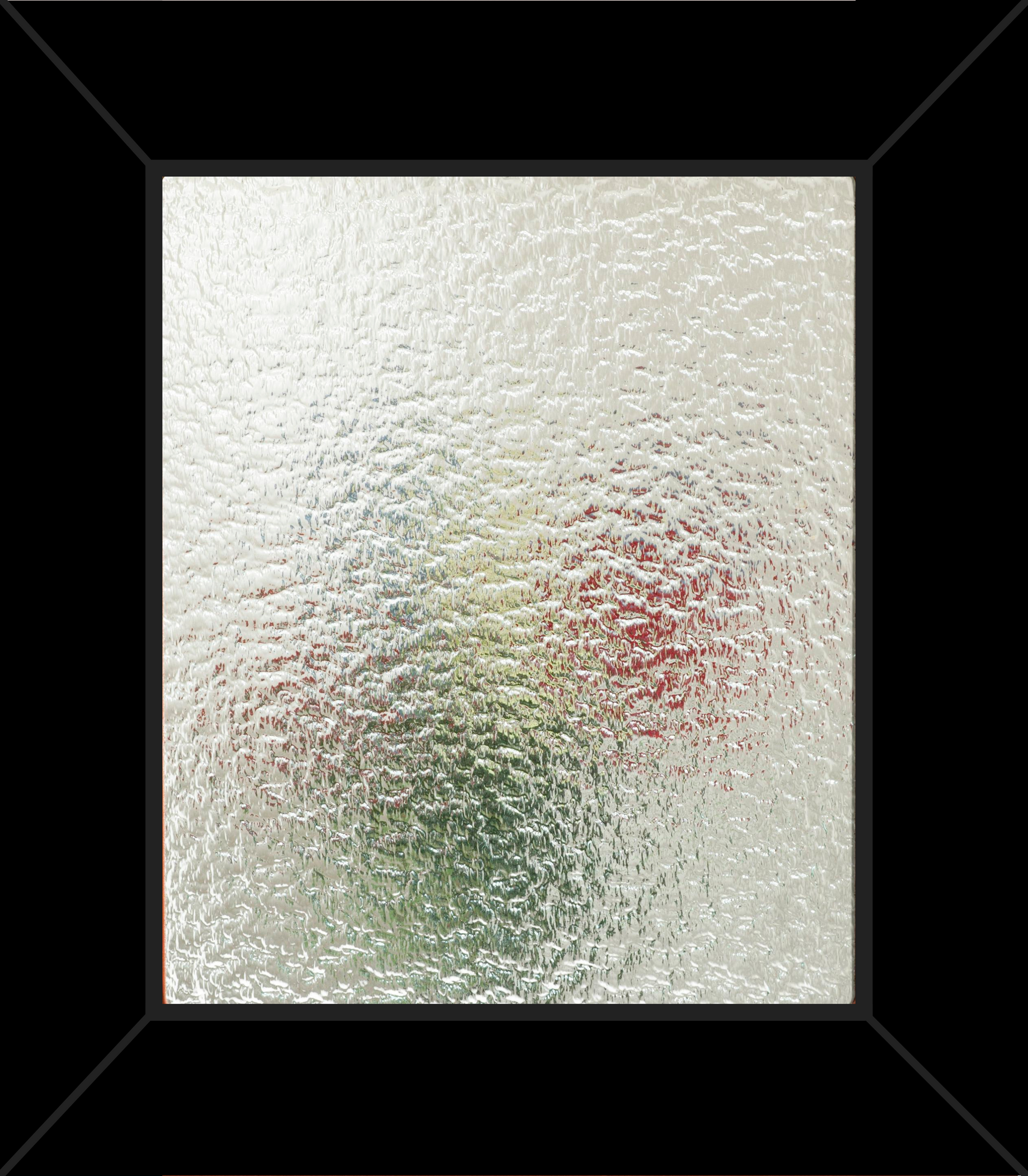 A picture of a glass window with a black frame and a flower in it.
