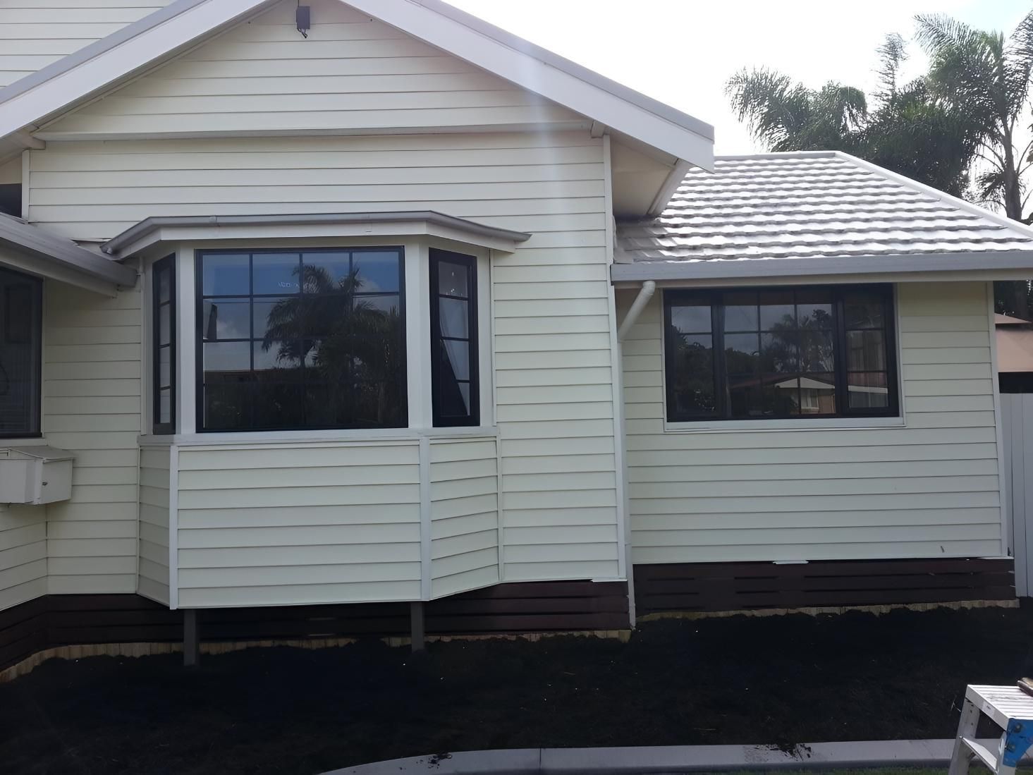 White House With Black Frame Window — Hervey Bay Glass Glazing & Screens In Maryborough, QLD