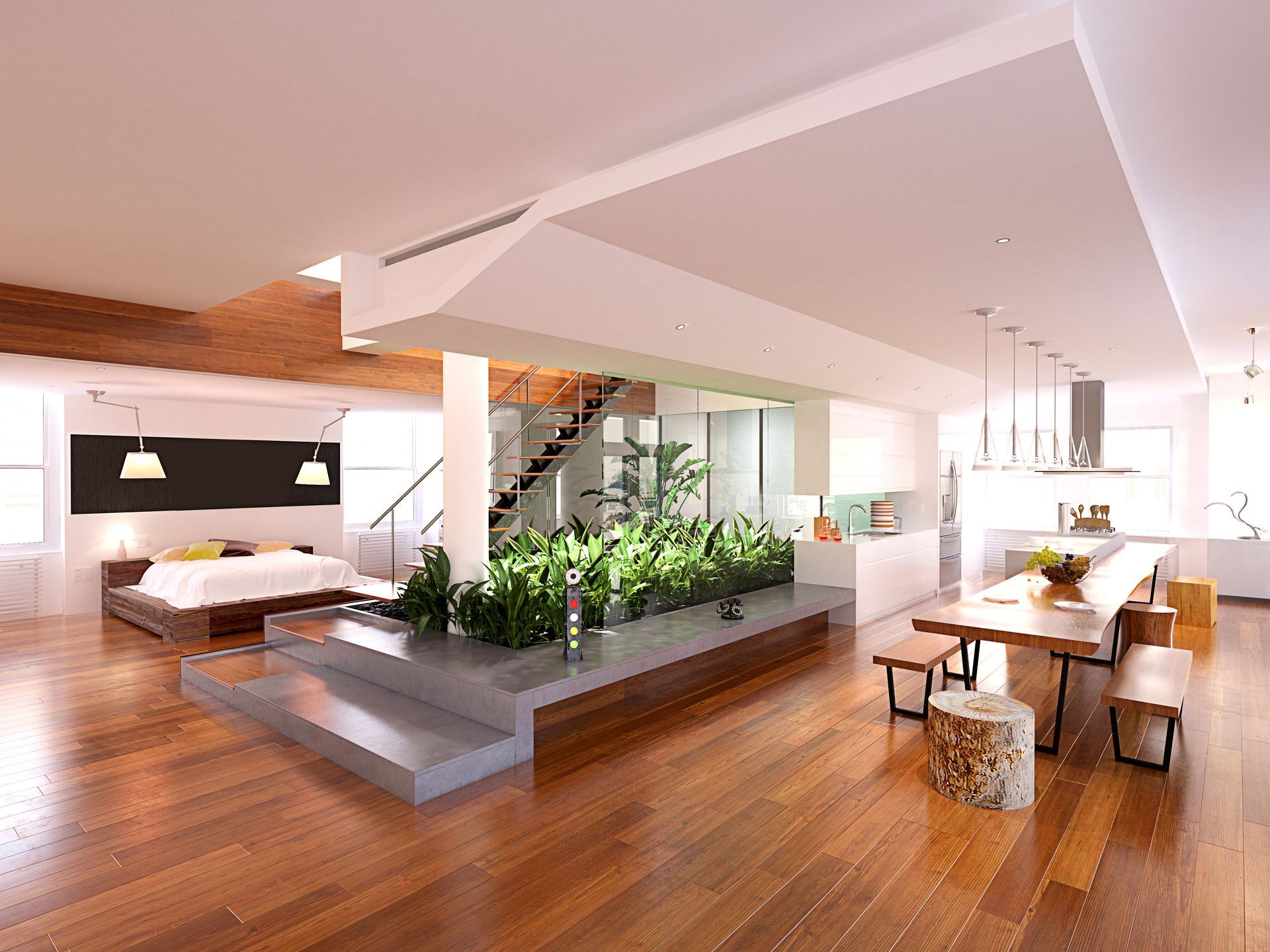 Modern open-plan living room with wood floors, white ceiling, indoor plants, and dining table area