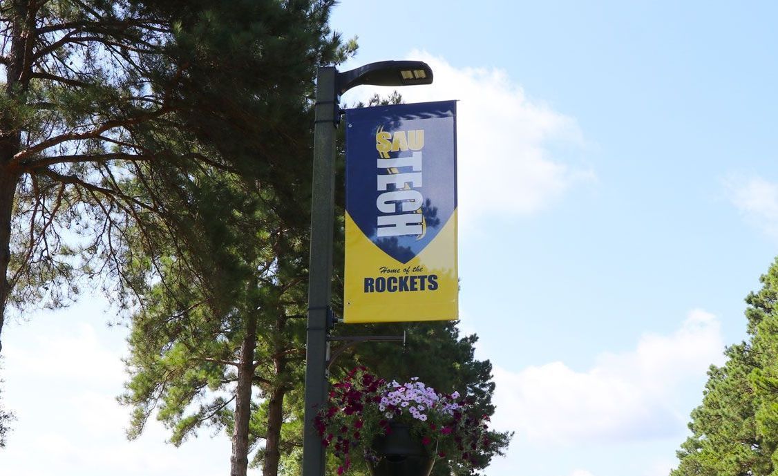 Banner on lamppost for a university: