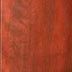 A close up of a piece of red wood.