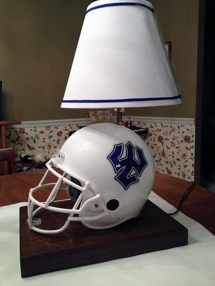 A lamp made out of a football helmet