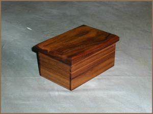 A small wooden box is sitting on a table