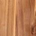 A close up of a piece of wood showing the grain and texture.