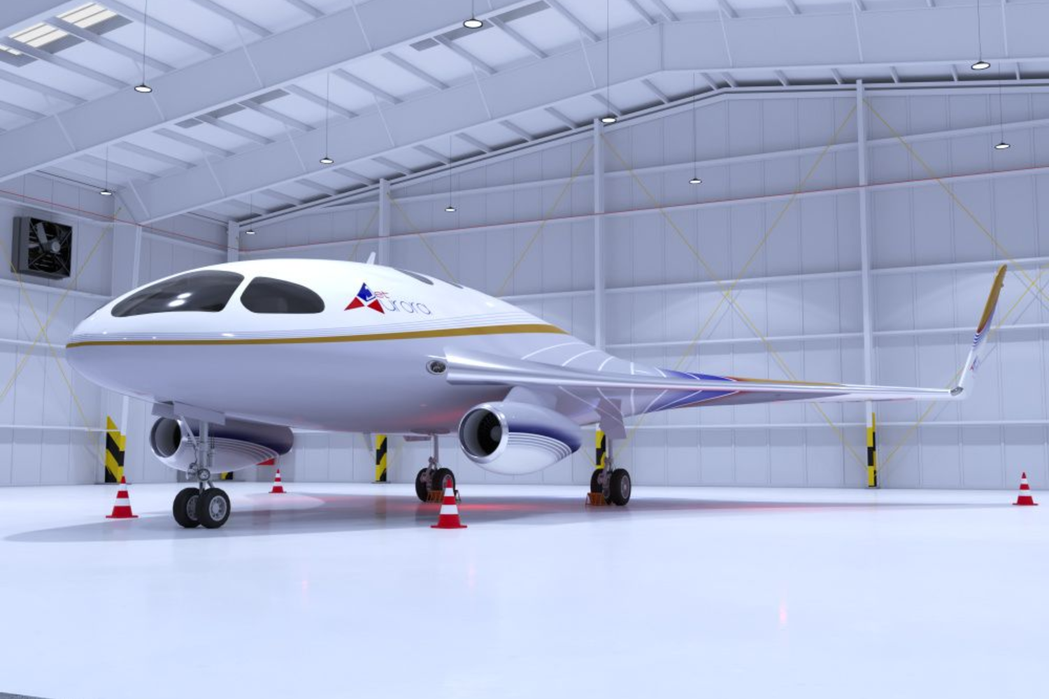 A white airplane with a long nose in a hangar, parked with orange cones in front.