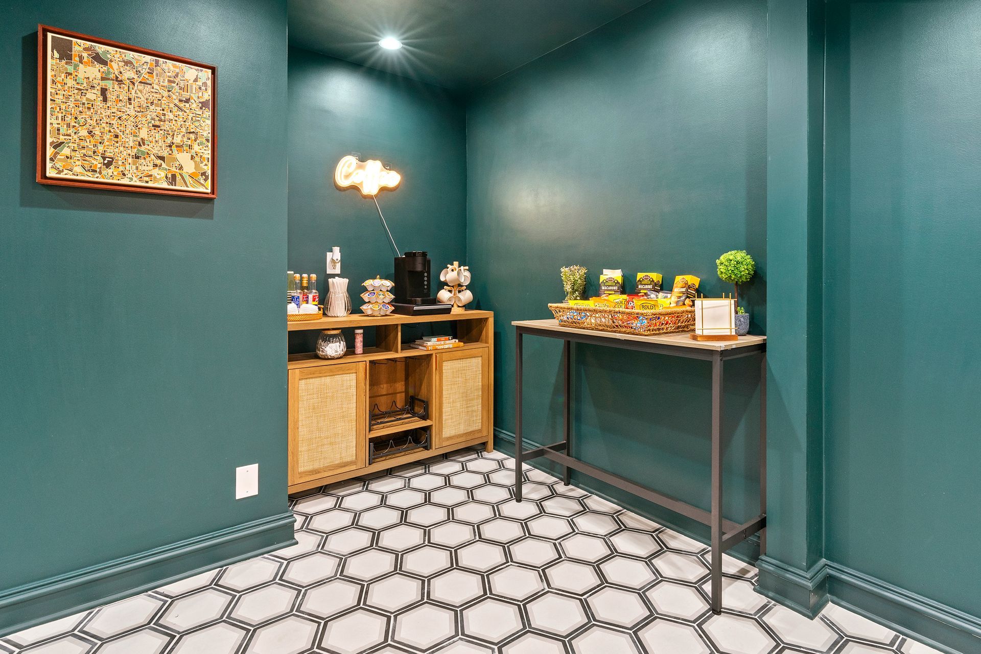 Teal room with buffet table, wooden cabinet, and hexagon-patterned tile floor