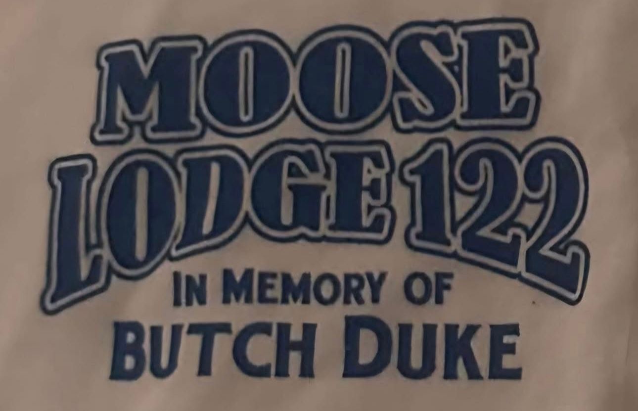 Moose Lodge 122 memorial text in blue: “In Memory of Butch Duke”