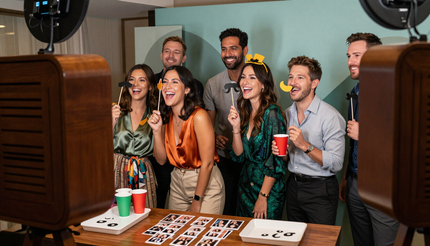 Corporate guests posing in the photo booth
