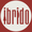 Logo circolare rosso e bianco con la parola “ibrido” in lettere minuscole stilizzate.