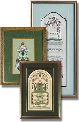 Three framed pictures are sitting next to each other
