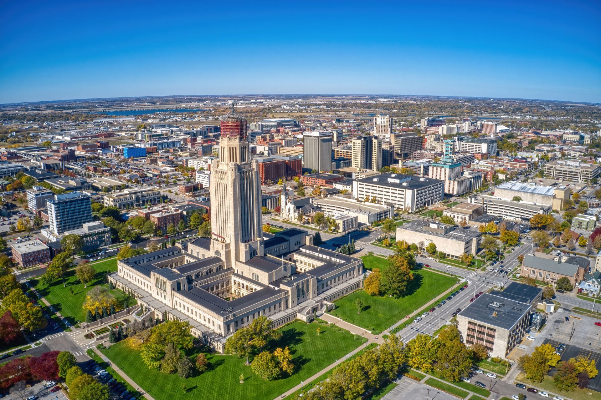 an aerial view of a large building in the middle of a city .