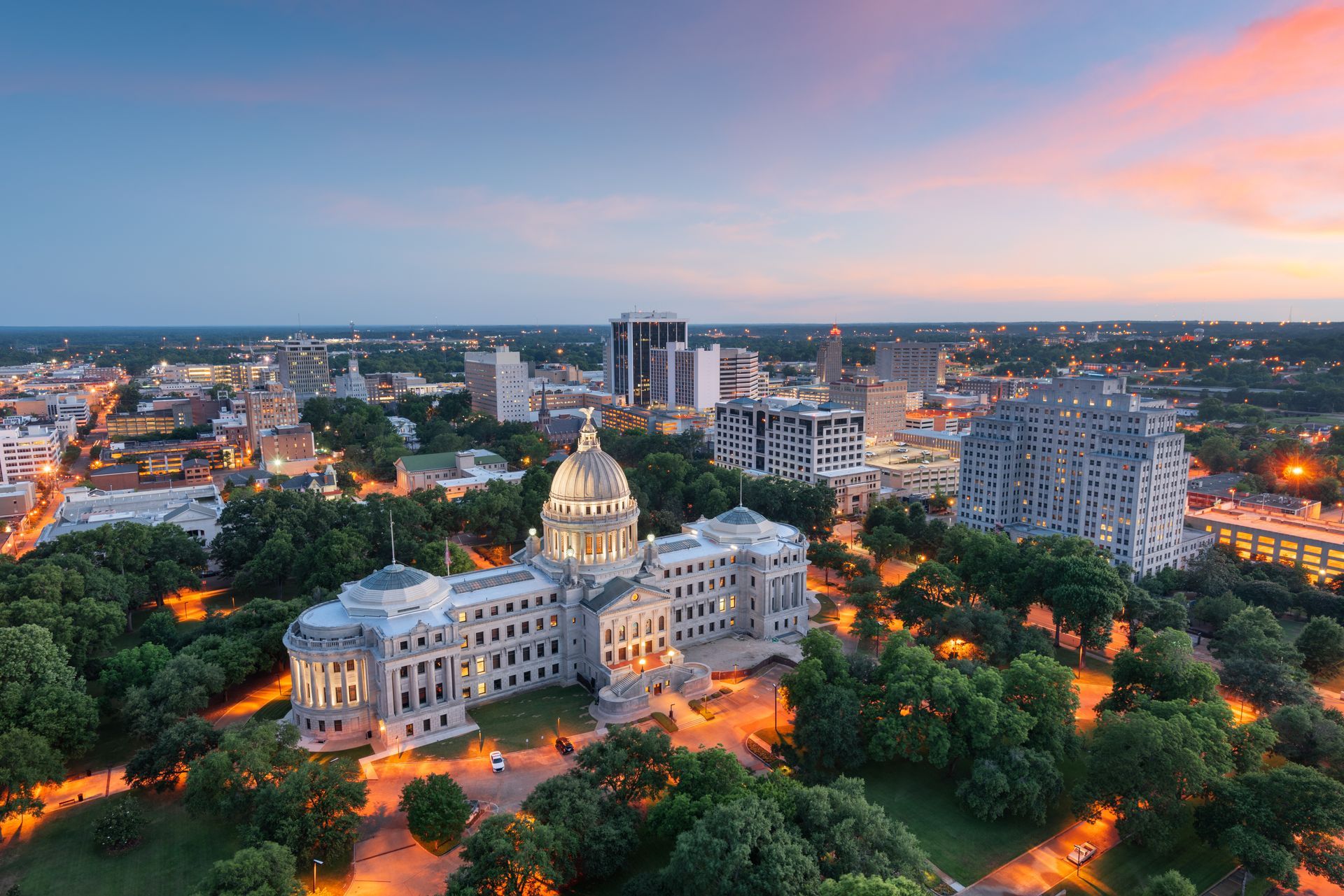 an aerial view of the capitol building in mississippi at night .