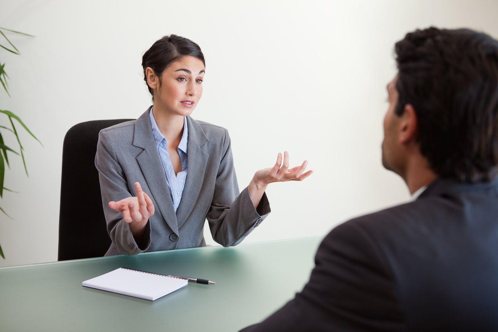 woman explaining to the man