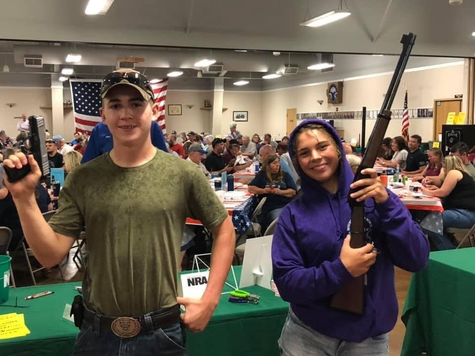 People showing licensed fire arms