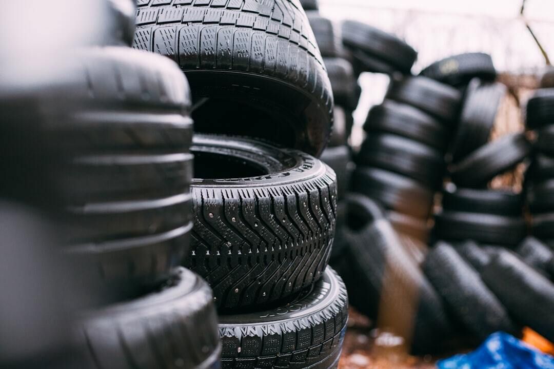 A pile of tires stacked on top of each other.