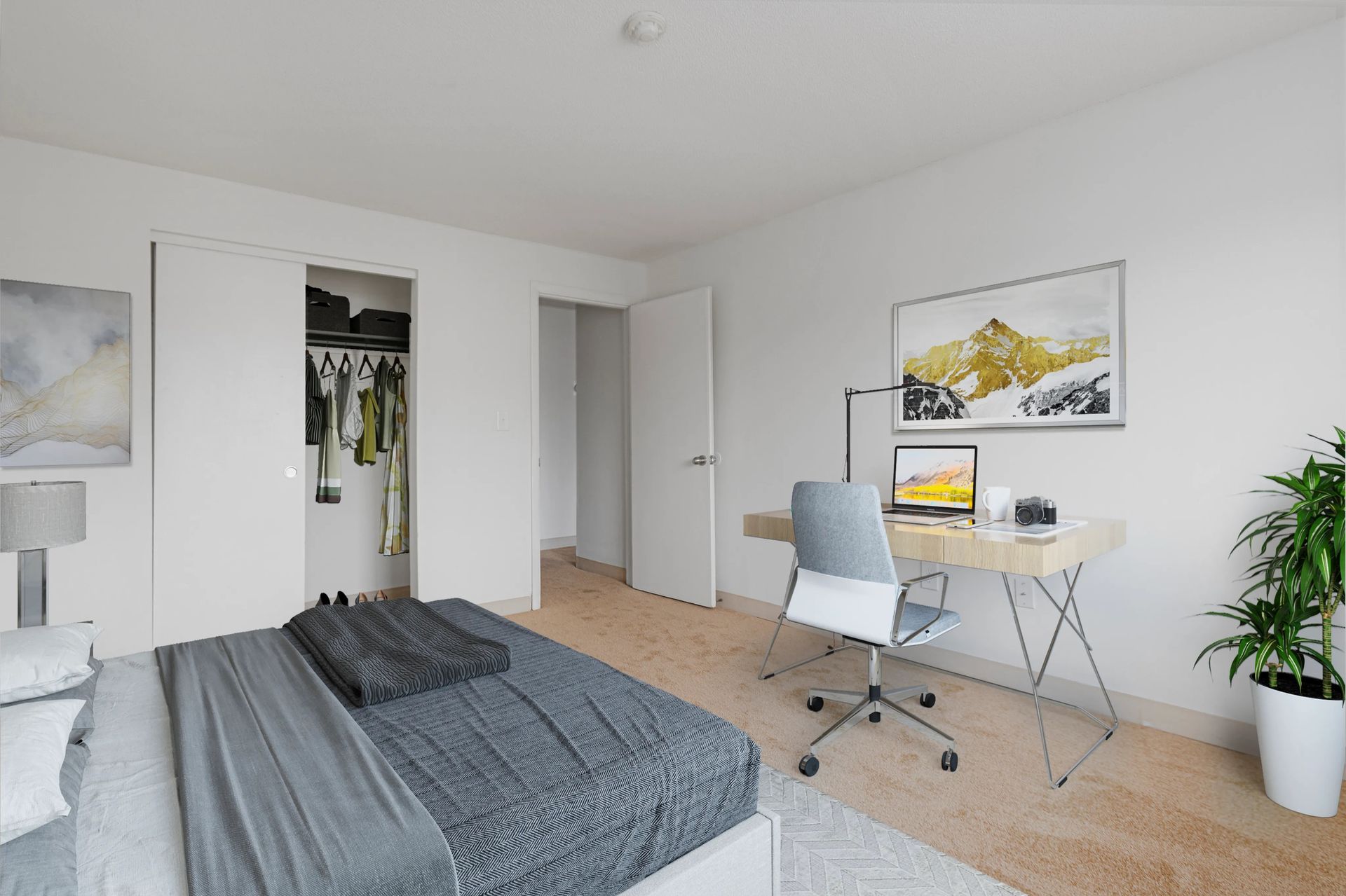 Bedroom with workspace at Northgate Apartments.