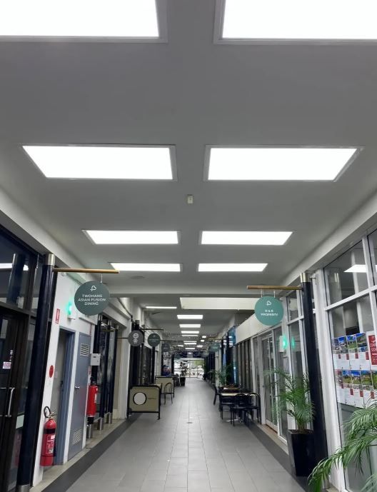 A Long Hallway With Lots of Lights on the Ceiling — J T Walker Solar & Electrical In Taree, NSW