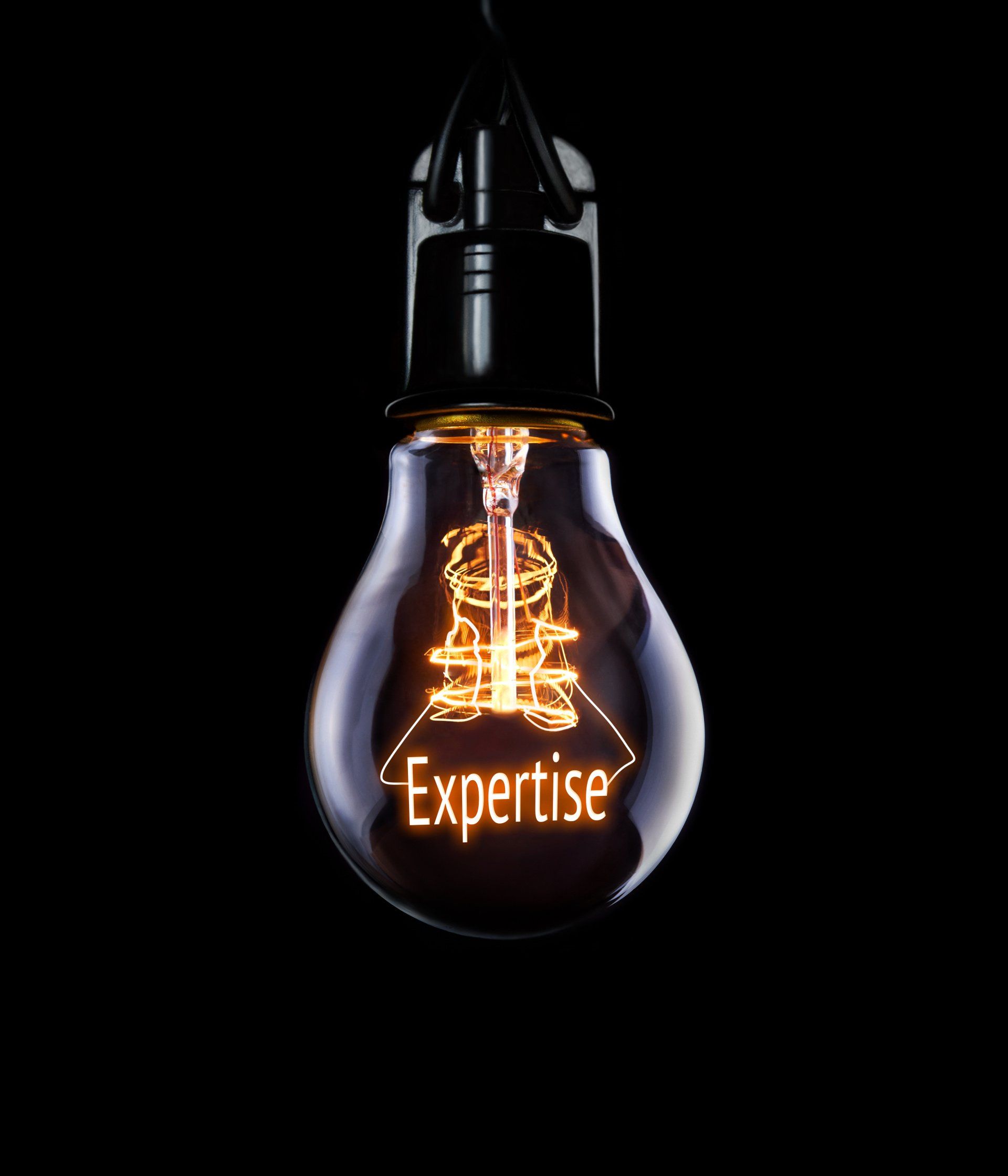 Glowing light bulb on a black background with the word “Expertise” inside