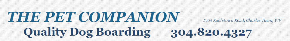 a logo for the pet companion quality dog boarding.