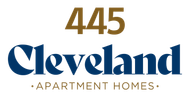 445 Cleveland Apartment Homes logo in blue and gold on a white background