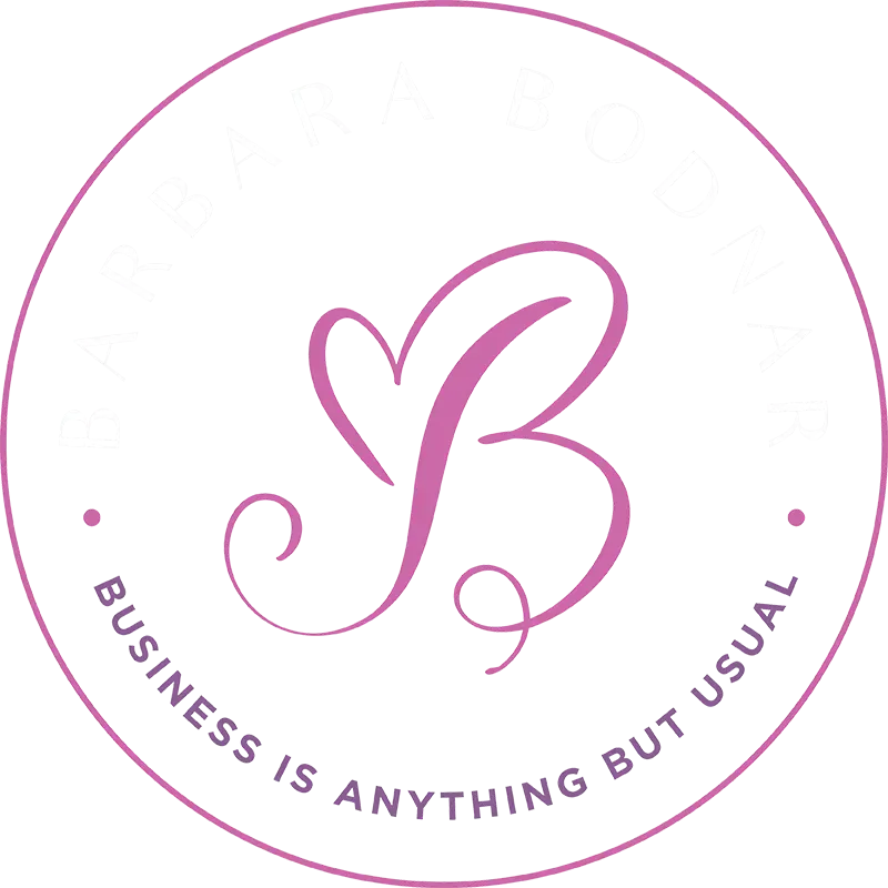 Pink circular logo with stylized “PB” and the words “Business is anything but usual” around the edge