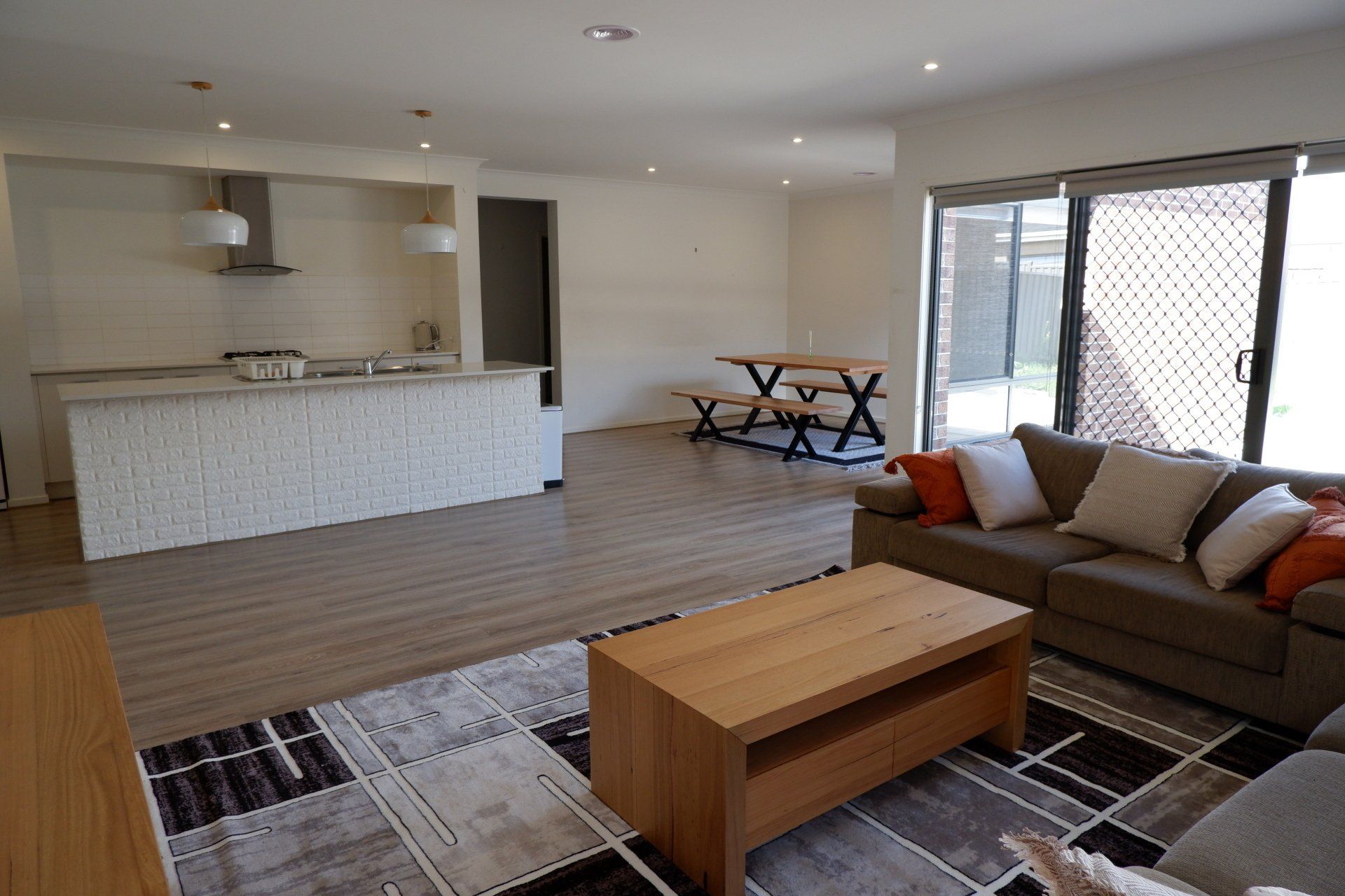 A living room with a couch and a coffee table