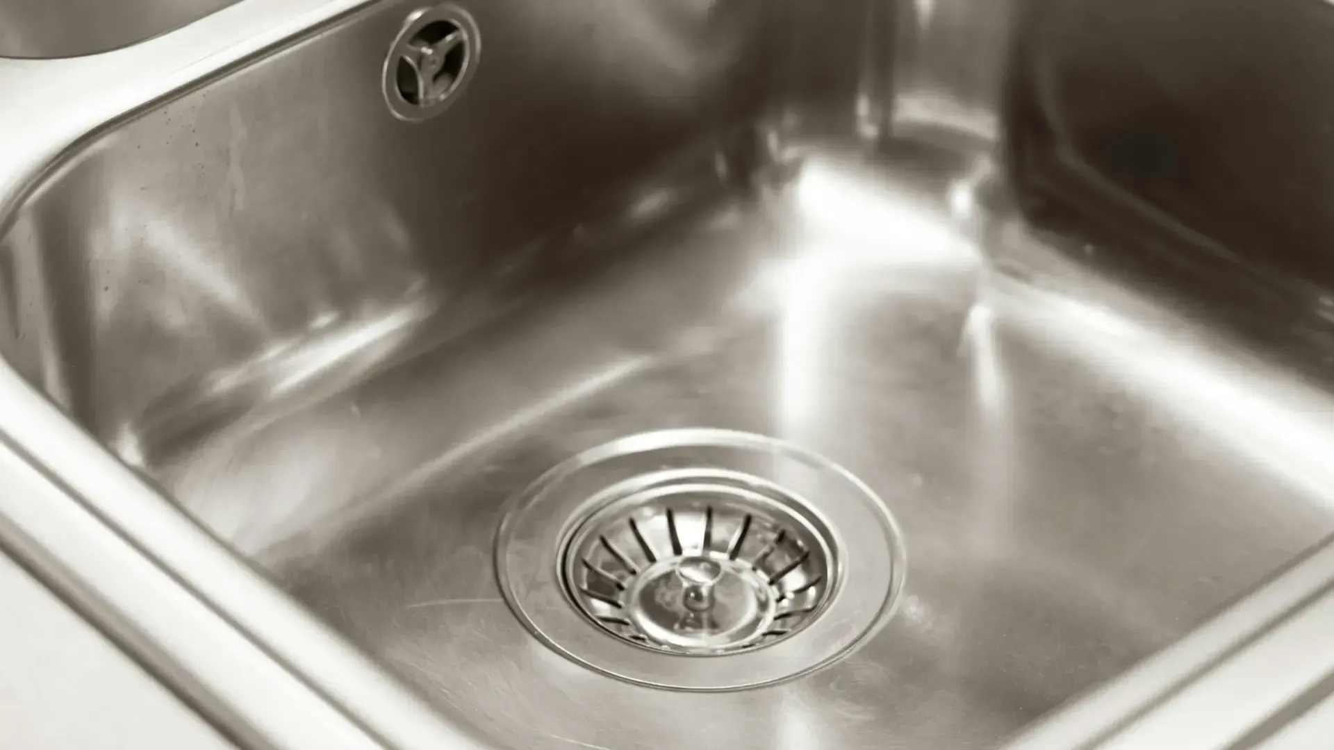 Sink drain with scrap catcher