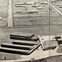 It is a black and white photo of an aerial view of a building.