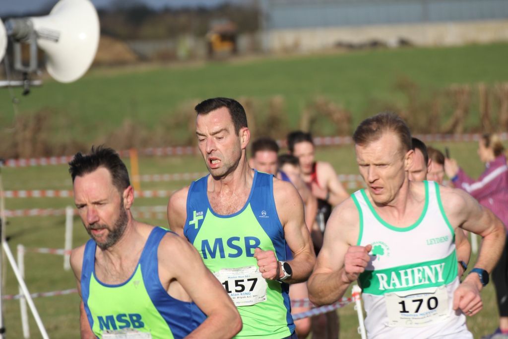A group of men are running in a race.