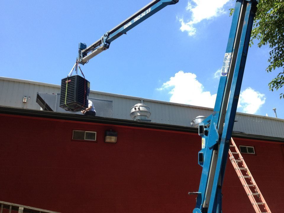 Installing Commercial AC Unit — LaGrange, KY — Comfort Zone
