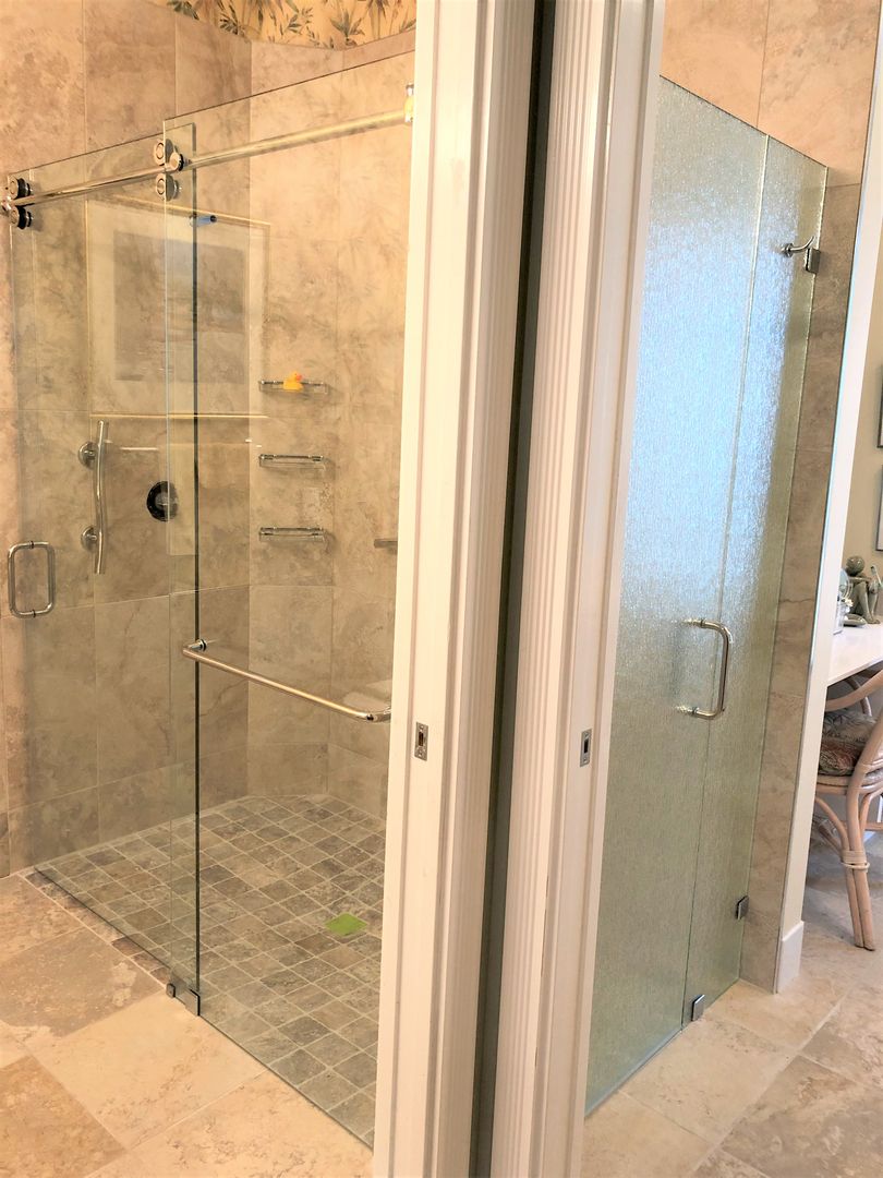 Sliding shower enclosure