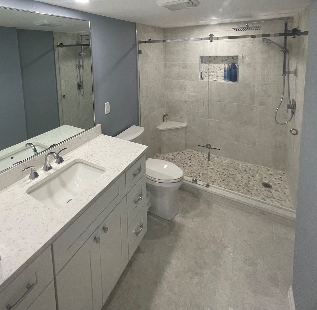 Sliding shower enclosure