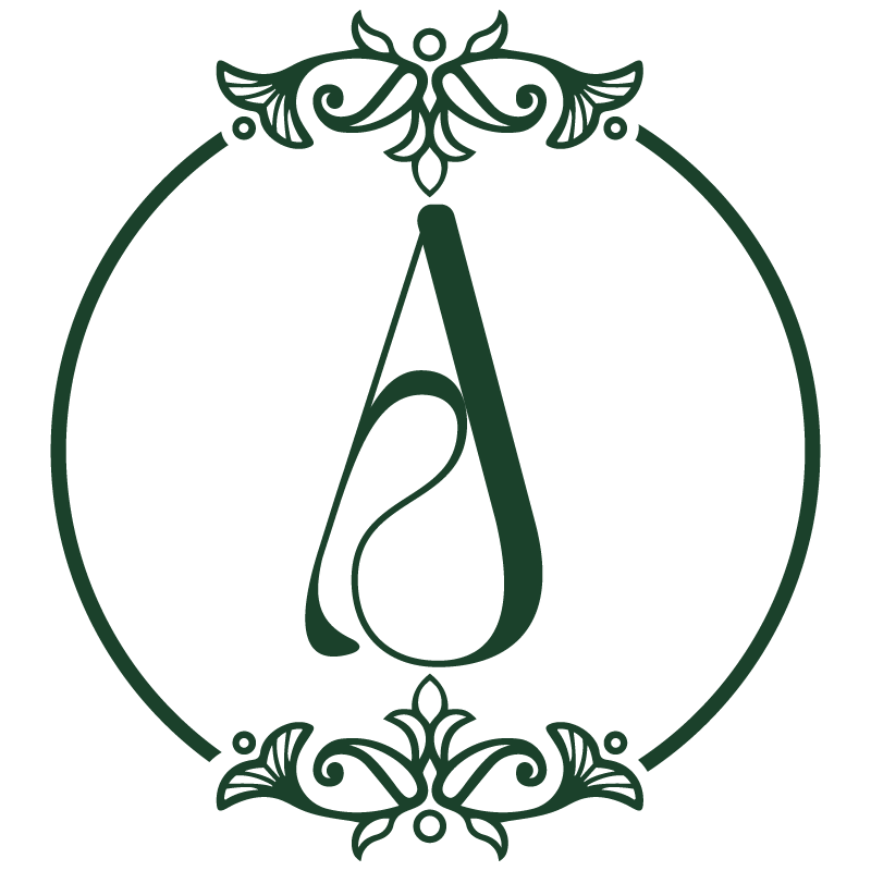 The letter a is in a green circle with a floral design around it.