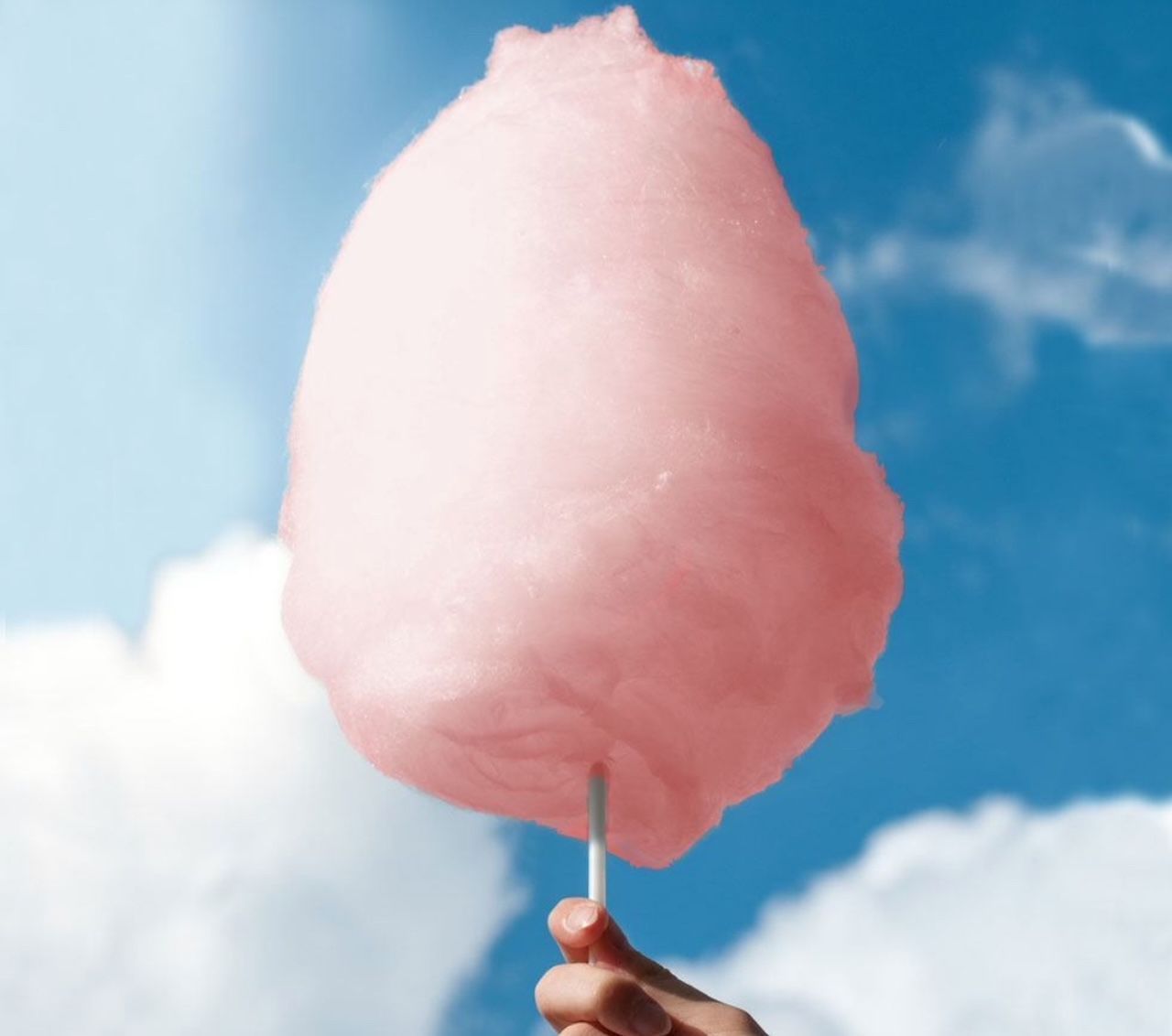 Concession Rentals — Cute Little Child Eating White Cotton Candy in In in Air in Deer Park, TX