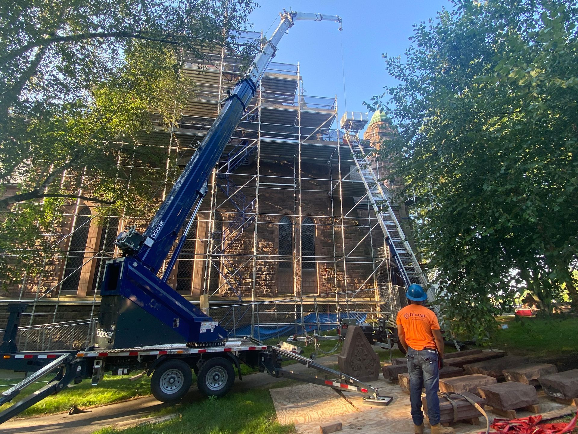 Bocker trailer crane and material hoist for roofing