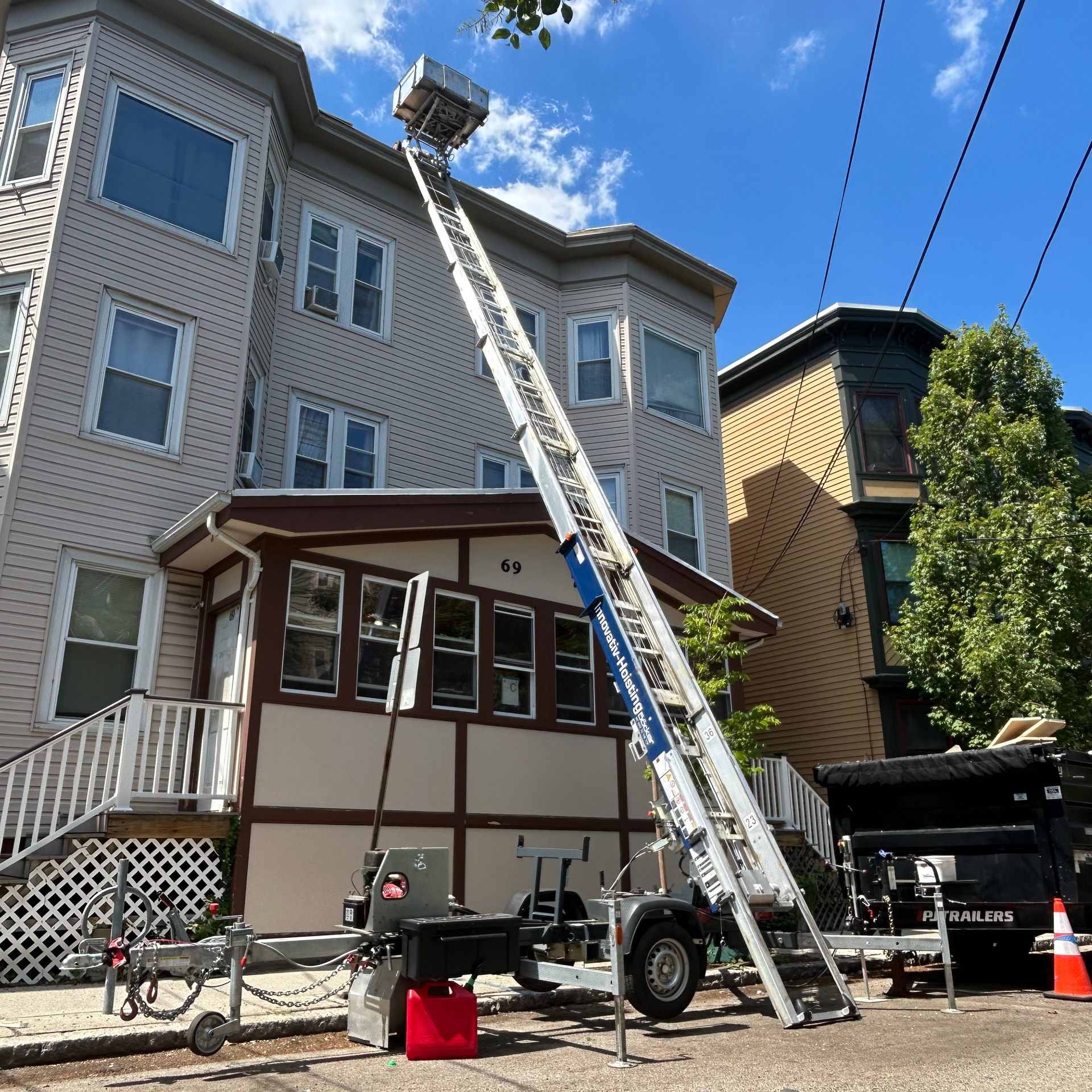 Böcker inclined material hoist on a residential roofing project from Innovativ Hoisting