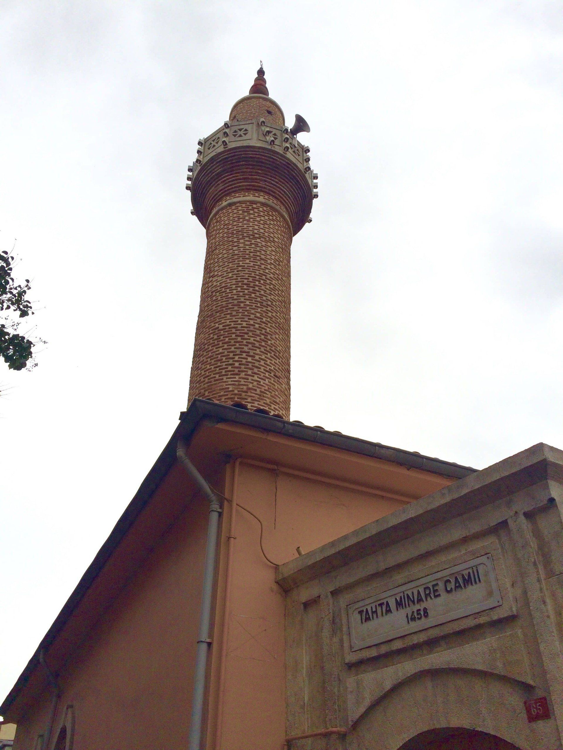 A building with a very tall tower on top of it