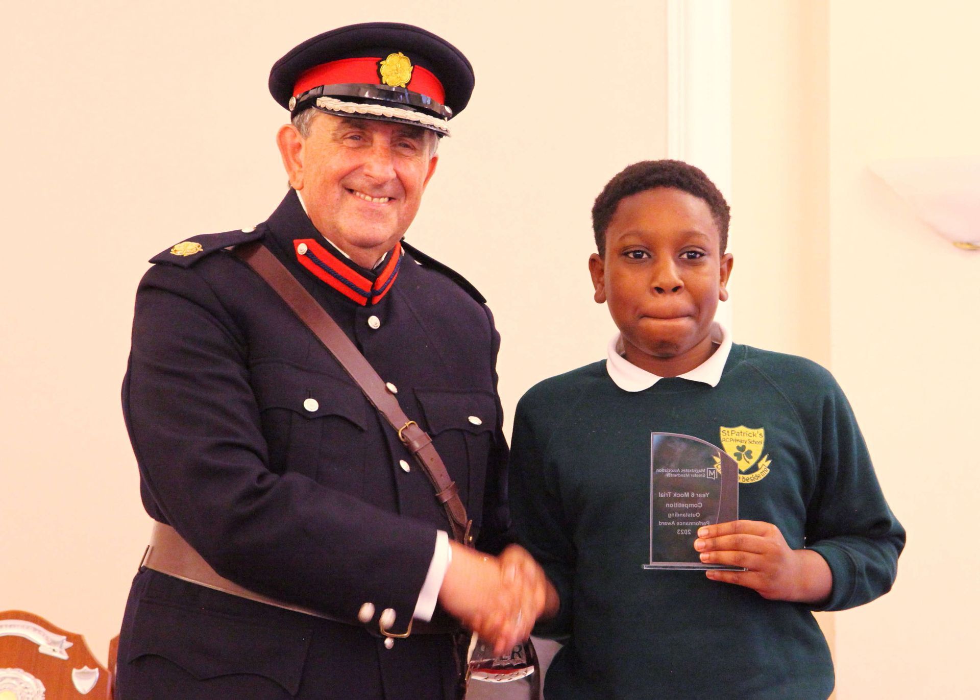 The High Sheriff presenting one of the 2024 Outstanding Individual Performance prizes