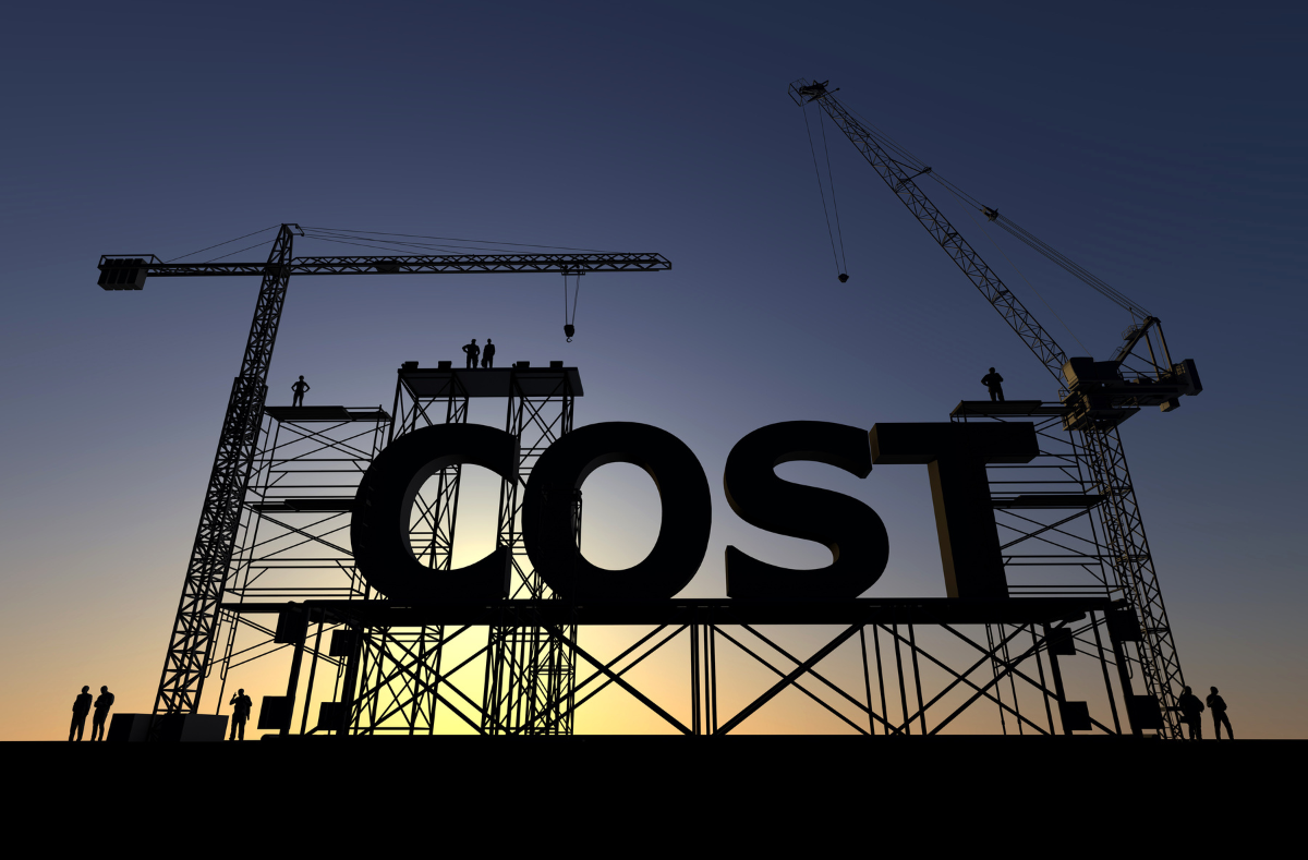 Silhouette of construction workers building the word